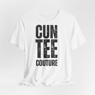 Trendy unisex casual white t-shirt with bold black slogan 'CUN TEE COUTURE' designed for comfort and style.